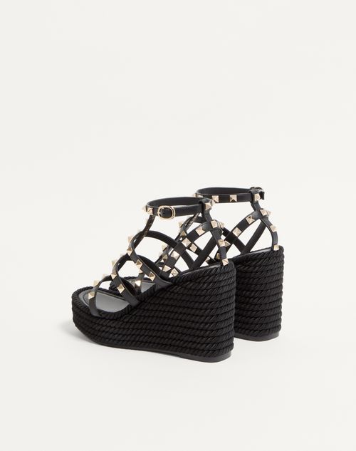 Valentino Garavani - Rockstud Ankle Strap Wedge Sandal In Calfskin Leather 95 Mm - Black - Woman - Espadrilles And Wedges